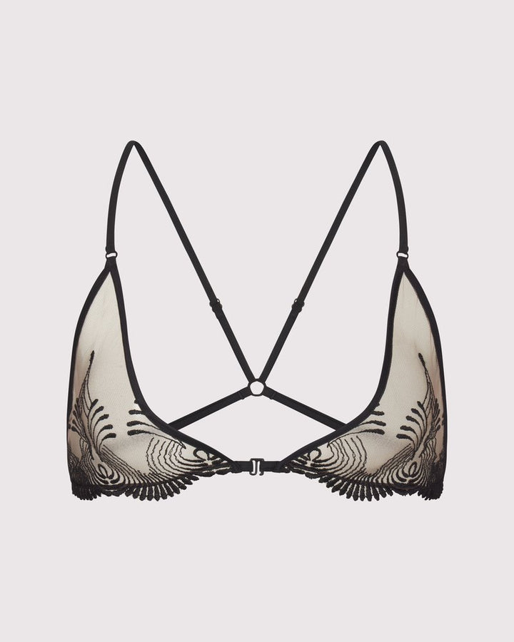 Sheer embroidered tulle triangle bra with delicate erotic detail, front clasp and soft cups. Adjustable cross-back straps. Made in NYC.