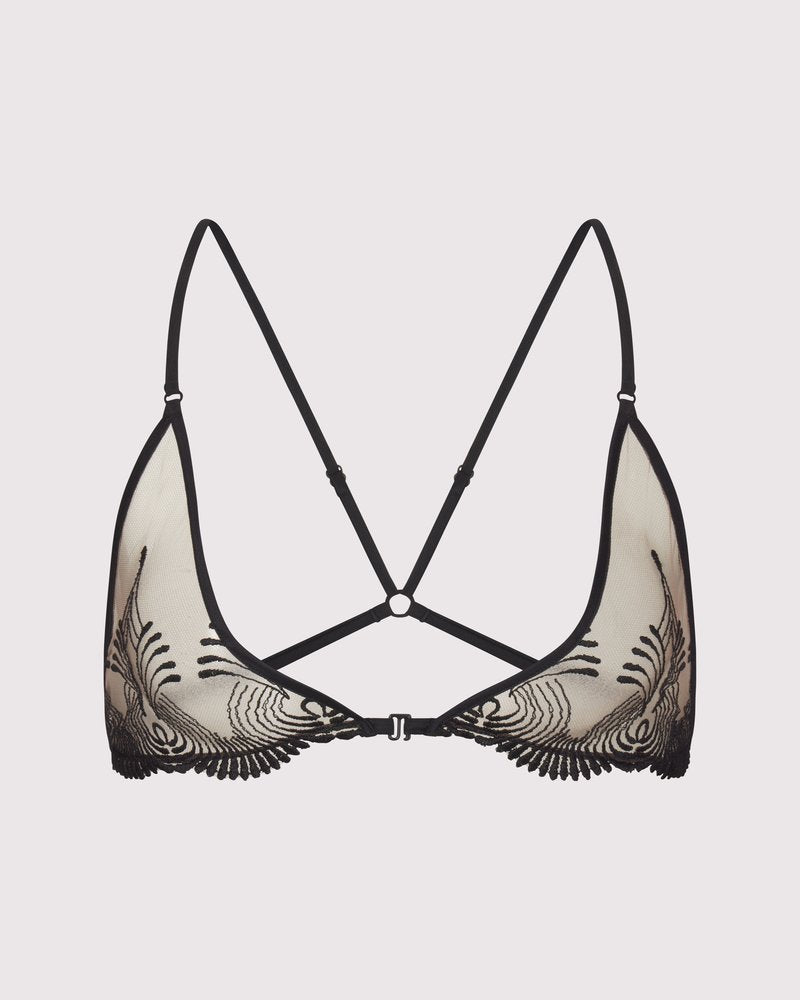 Sheer embroidered tulle triangle bra with delicate erotic detail, front clasp and soft cups. Adjustable cross-back straps. Made in NYC.